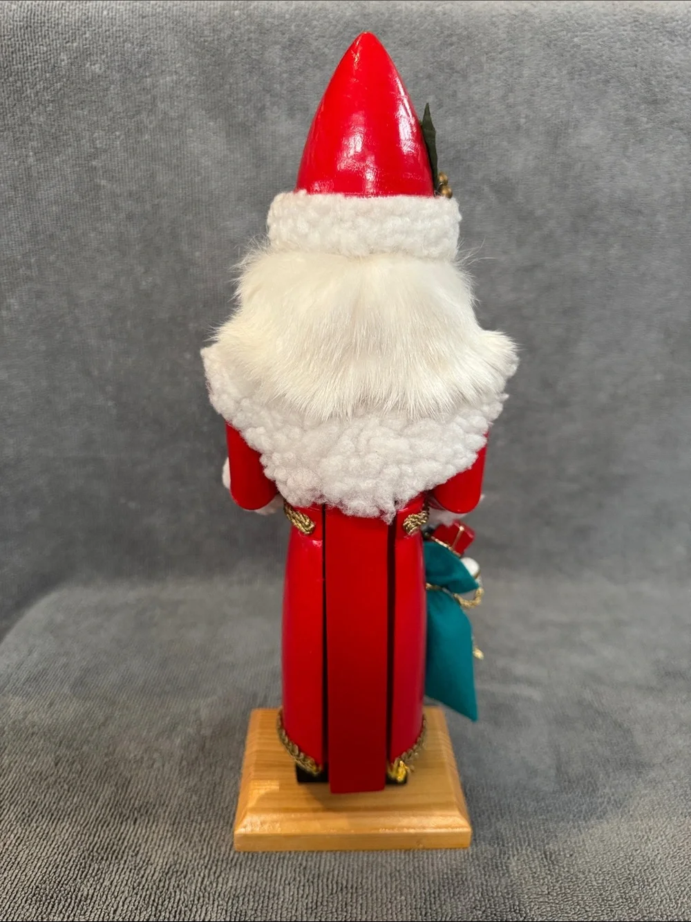 1990s 13.75 inch Santa Nutcracker with Green Tree and Sack of Toys Holiday Decor
